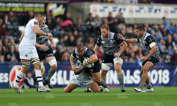 151017 - Ospreys v Clermont Auvergne - European Rugby Champions Cup - Dmitri Arhip of Ospreys is tackled by Raphael Chaume of Clermont