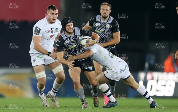 151017 - Ospreys v Clermont Auvergne - European Rugby Champions Cup - Dan Evans of Ospreys is tackled by Morgan Parra of Clermont