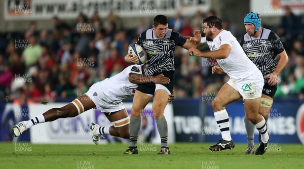 151017 - Ospreys v Clermont Auvergne - European Rugby Champions Cup - Owen Watkin of Ospreys is tackled by Peceli Yato and Etienne Falgoux of Clermont