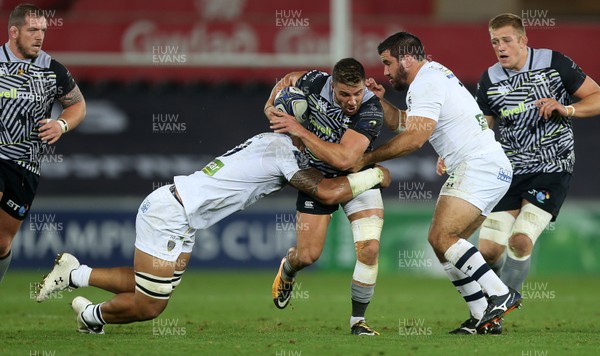 151017 - Ospreys v Clermont Auvergne - European Rugby Champions Cup - Rhys Webb of Ospreys is tackled by Sitaleki Timani and Etienne Falgoux of Clermont
