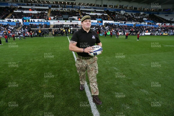 151017 - Ospreys v Clermont Auvergne - European Rugby Champions Cup - Ex Ospreys player Matthew Dwyer and current solider presents the match ball