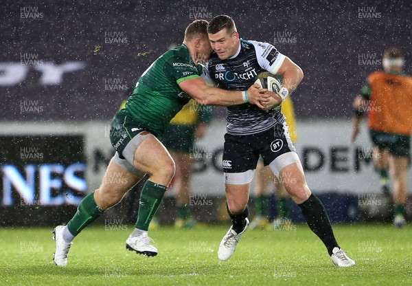 021119 - Ospreys v Connacht - Guinness PRO14 - Scott Williams of Ospreys is tackled by Peter Robb of Connacht
