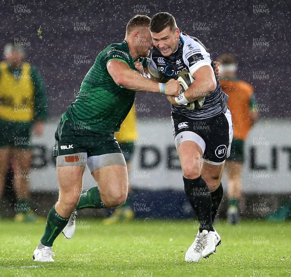 021119 - Ospreys v Connacht - Guinness PRO14 - Scott Williams of Ospreys is tackled by Peter Robb of Connacht