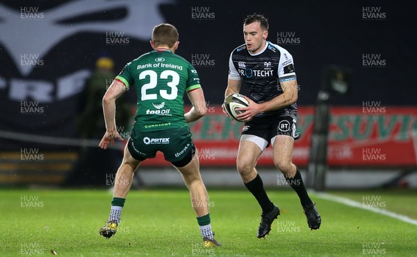 021119 - Ospreys v Connacht - Guinness PRO14 - Cai Evans of Ospreys is challenged by Stephen Fitzgerald of Connacht