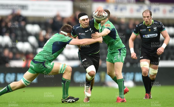 070117 - Ospreys v Connacht - Guinness PRO12 - Josh Matavesi of Ospreys is tackled by James Cannon and John Cooney of Connacht by Ben Evans/Huw Evans Agency