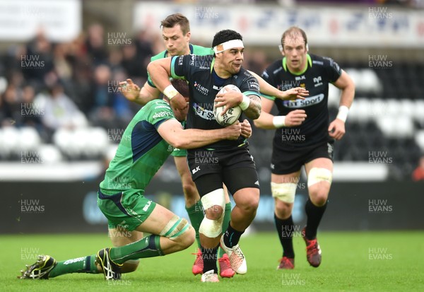 070117 - Ospreys v Connacht - Guinness PRO12 - Josh Matavesi of Ospreys is tackled by James Cannon and John Cooney of Connacht by Ben Evans/Huw Evans Agency