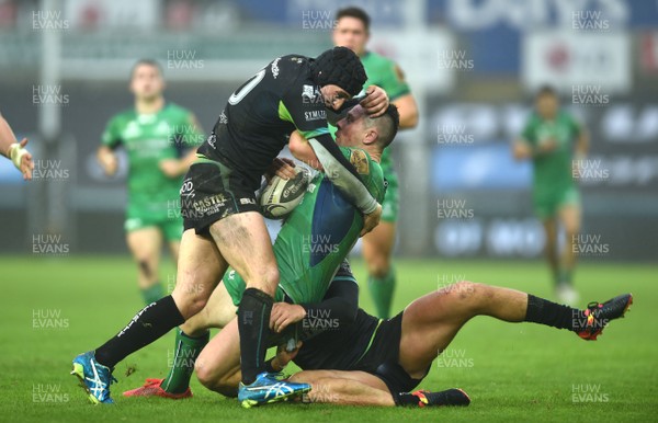 070117 - Ospreys v Connacht - Guinness PRO12 - Sam Davies of Ospreys tackles John Cooney of Connacht before receiving a yellow card for the tackle by Ben Evans/Huw Evans Agency