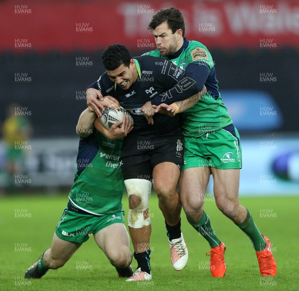 070117 - Ospreys v Connacht - Guinness PRO12 - Josh Matavesi of Ospreys is tackled by Caolin Blade and Danie Poolman of Connacht by Chris Fairweather/Huw Evans Agency