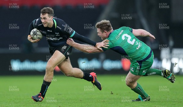 070117 - Ospreys v Connacht - Guinness PRO12 - Ashley Beck of Ospreys is tackled by Tom McCartney of Connacht by Chris Fairweather/Huw Evans Agency