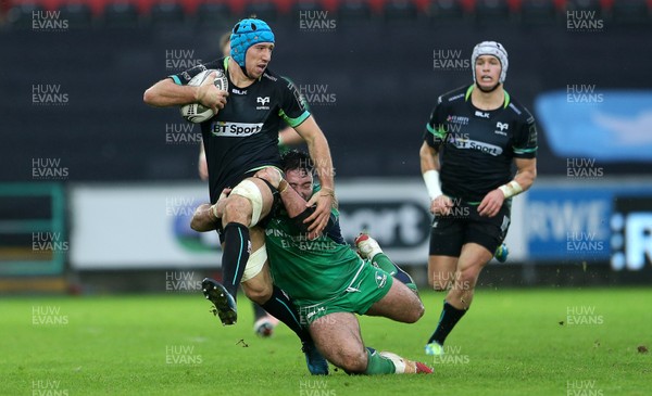 070117 - Ospreys v Connacht - Guinness PRO12 - Justin Tipuric of Ospreys is tackled by Denis Buckley of Connacht by Chris Fairweather/Huw Evans Agency