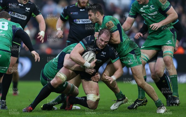 070117 - Ospreys v Connacht - Guinness PRO12 - Alun Wyn Jones of Ospreys is tackled by Eoin McKeon of Connacht by Chris Fairweather/Huw Evans Agency