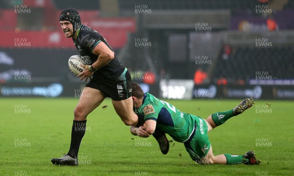 070117 - Ospreys v Connacht - Guinness PRO12 - Dan Evans of Ospreys is tackled by Caolin Blade of Connacht by Chris Fairweather/Huw Evans Agency