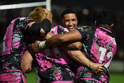 071225 - Ospreys v Connacht - EPCR Challenge Cup - Iestyn Hopkins of Ospreys celebrates scoring a try with team mates