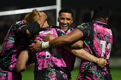 071225 - Ospreys v Connacht - EPCR Challenge Cup - Iestyn Hopkins of Ospreys celebrates scoring a try with team mates