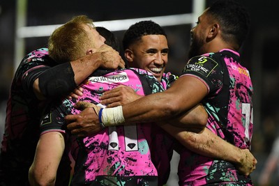 071225 - Ospreys v Connacht - EPCR Challenge Cup - Iestyn Hopkins of Ospreys celebrates scoring a try with team mates