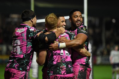 071225 - Ospreys v Connacht - EPCR Challenge Cup - Iestyn Hopkins of Ospreys celebrates scoring a try with team mates