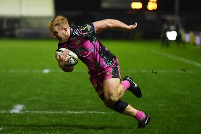 071225 - Ospreys v Connacht - EPCR Challenge Cup - Iestyn Hopkins of Ospreys runs in to score a try
