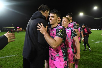 071225 - Ospreys v Connacht - EPCR Challenge Cup - Reuben Morgan-Williams of Ospreys celebrates the win with team mates at full time