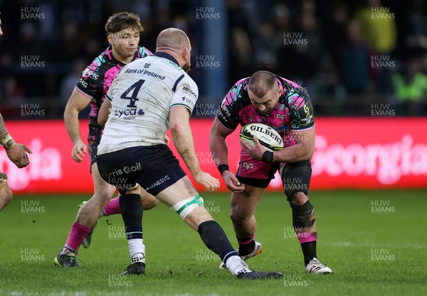 071225 - Ospreys v Connacht - European Challenge Cup - Sam Parry of Ospreys is tackled by Joe Joyce of Connacht 