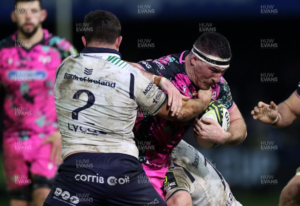 071225 - Ospreys v Connacht - European Challenge Cup - Ryan Smith of Ospreys is tackled by Dave Heffernan of Connacht 