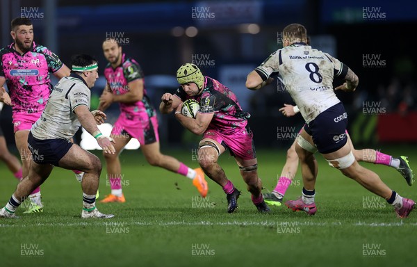 071225 - Ospreys v Connacht - European Challenge Cup - Harri Deaves of Ospreys is challenged by Sean Jansen of Connacht 