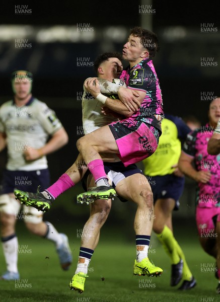 071225 - Ospreys v Connacht - European Challenge Cup - Dan Edwards of Ospreys and Harry West of Connacht collide in the air