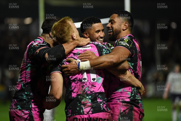 071225 - Ospreys v Connacht - EPCR Challenge Cup - Iestyn Hopkins of Ospreys celebrates scoring a try with team mates