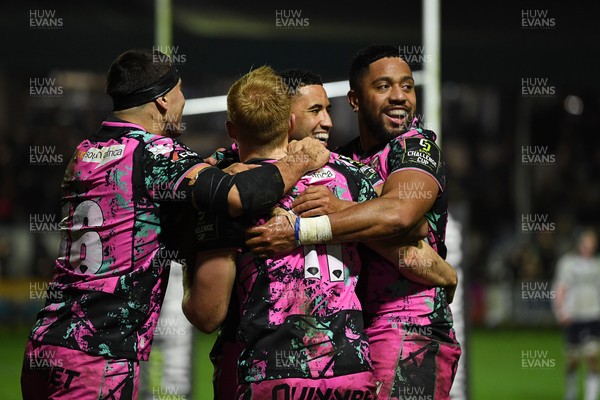 071225 - Ospreys v Connacht - EPCR Challenge Cup - Iestyn Hopkins of Ospreys celebrates scoring a try with team mates