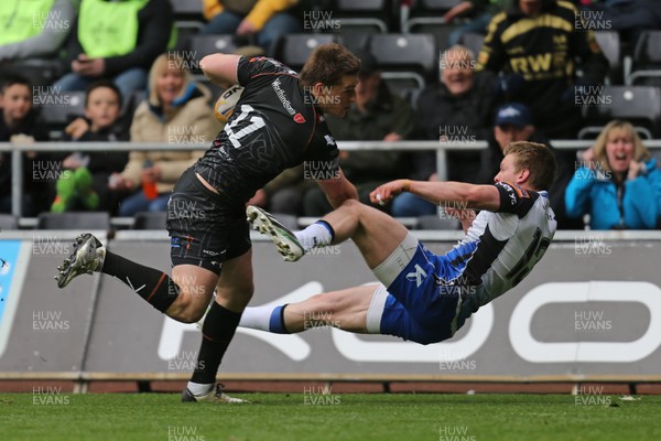 100514 - Ospreys v Connacht, RaboDirect PRO12 - Osprey's Jeff Hassler brushes off Connacht's Eoin Griffin on his way to scoring try