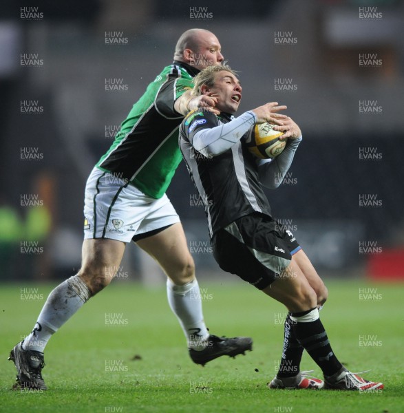 16.02.08 - Ospreys v Connacht - Magners League - Ospreys Justin Marshall is tackled by Connacht's Robbie Morris 