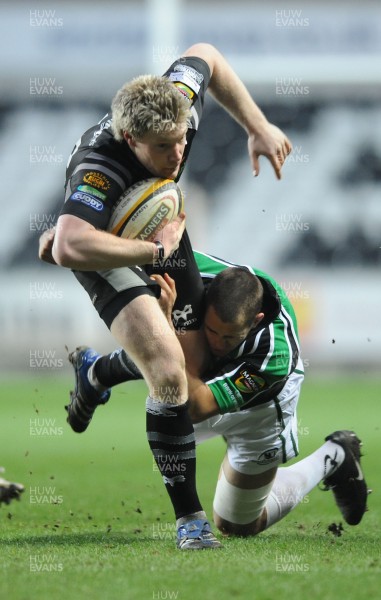 16.02.08 - Ospreys v Connacht - Magners League - Ospreys Jonathan Spratt beats tackle by Connacht's Mike McCarthy 