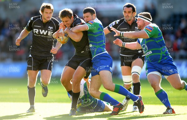 271012 - Ospreys v Connacht - RaboDirect PRO12 -Ashley Beck of Ospreys is tackled by Robbie Henshaw of Connacht