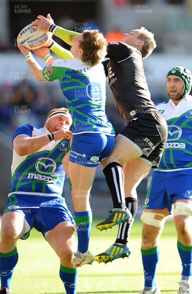 271012 - Ospreys v Connacht - RaboDirect PRO12 -Hanno Dirksen of Ospreys and Connor O'Loughlin of Connacht compete for high ball