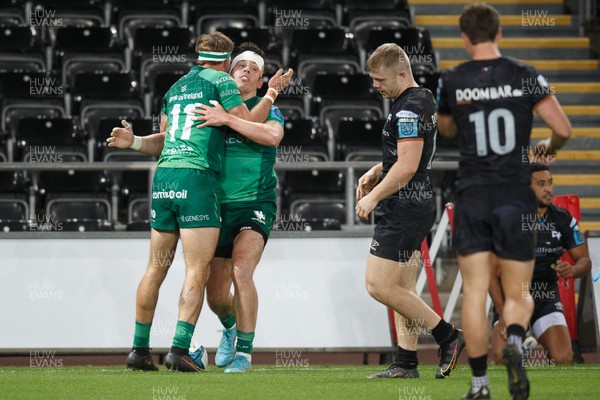 291022 - Ospreys v Connacht - United Rugby Championship - Alex Wootton of Connacht celebrates with John Porch after scoring a try