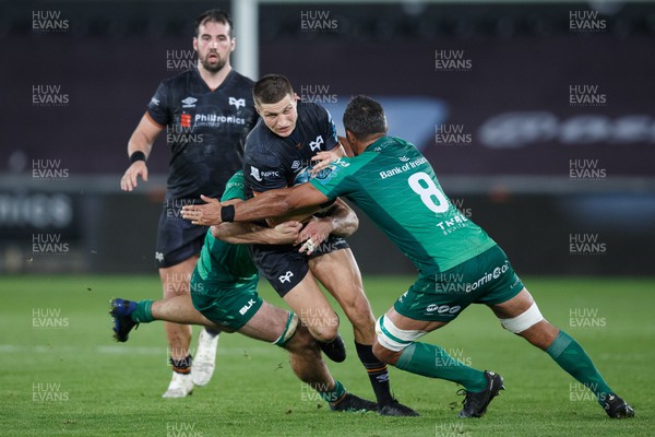 291022 - Ospreys v Connacht - United Rugby Championship - Max Nagy of Ospreys is tackled by Jarrad Butler of Connacht