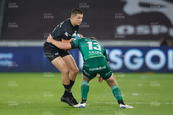 291022 - Ospreys v Connacht - United Rugby Championship - Max Nagy of Ospreys is tackled by Tom Farrell of Connacht