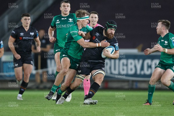 291022 - Ospreys v Connacht - United Rugby Championship - Morgan Morris of Ospreys is tackled by John Porch of Connacht