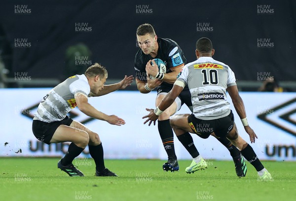 141022 - Ospreys v DHL Stormers - BKT United Rugby Championship - George North of Ospreys is tackled by Paul de Wet and Manie Libbok of Stormers