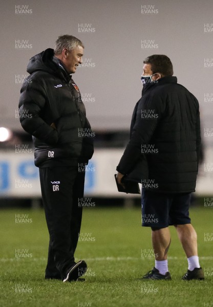 060321 Ospreys v Dragons, Guinness PRO14 - Dragons head coach Dean Ryan, left, chats with Ospreys head coach Toby Booth ahead of the match between the two teams