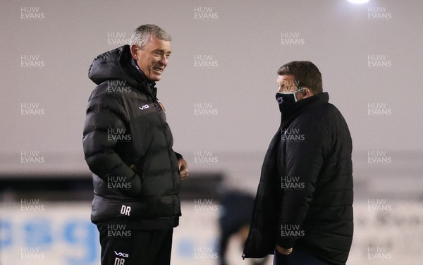 060321 Ospreys v Dragons, Guinness PRO14 - Dragons head coach Dean Ryan, left, chats with Ospreys head coach Toby Booth ahead of the match between Ospreys and Dragons