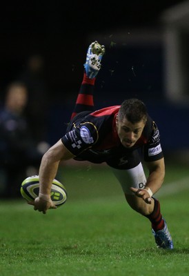 141114 -  Ospreys v Newport Gwent Dragons, LV= Cup, Brewery Field, Bridgend - Dragons' Dorian Jones releases the ball after being ankle tapped