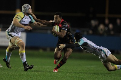 141114 -  Ospreys v Newport Gwent Dragons, LV= Cup, Brewery Field, Bridgend - Ashton Hewitt hands off Ifereimi Boladau