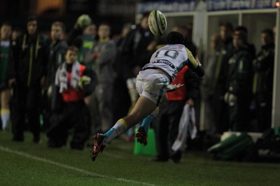 141114 -  Ospreys v Newport Gwent Dragons, LV= Cup, Brewery Field, Bridgend - Sam Davies tries to stop the ball entering touch from a kick