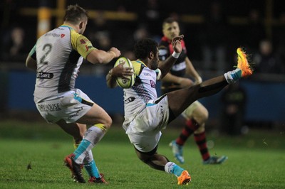 141114 -  Ospreys v Newport Gwent Dragons, LV= Cup, Brewery Field, Bridgend - Aisea Natoa slips when on the attack for the Ospreys