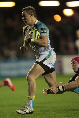 141114 -  Ospreys v Newport Gwent Dragons, LV= Cup, Brewery Field, Bridgend - Hanno Dirksen breaks to score for the Ospreys