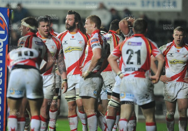 220313 -  Ospreys v Newport-Gwent Dragons - RaboDirect PRO12 -Dragons players look dejected 