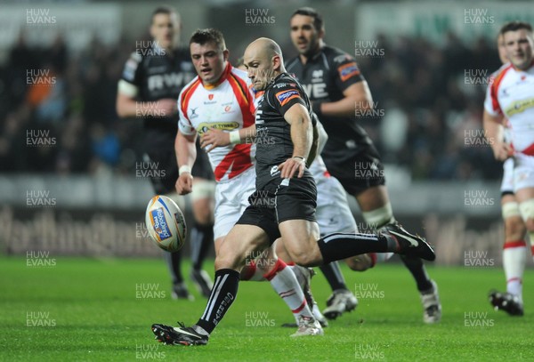 220313 -  Ospreys v Newport-Gwent Dragons - RaboDirect PRO12 -Richard Fussell of Ospreys clears the ball 