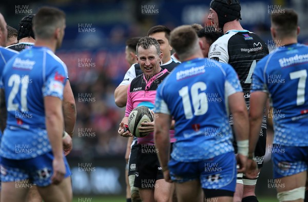 230319 - Ospreys v Dragons - Guinness PRO14 - Referee Nigel Owens gets hold of the ball