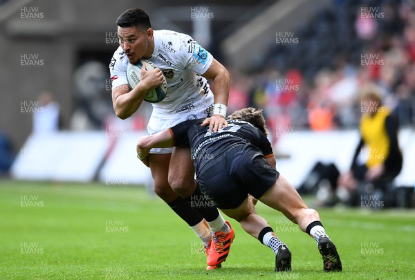 250323 - Ospreys v Dragons - United Rugby Championship - Sio Tomkinson of Dragons is tackled by Jack Walsh of Ospreys