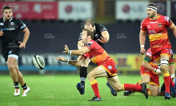 271017 - Ospreys v Dragons Rugby - Guinness PRO14 - Sarel Pretorius of Dragons gets the ball away
